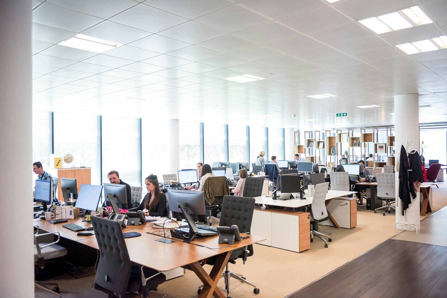 Office desks with IP phones on a Yeastar-ready estate